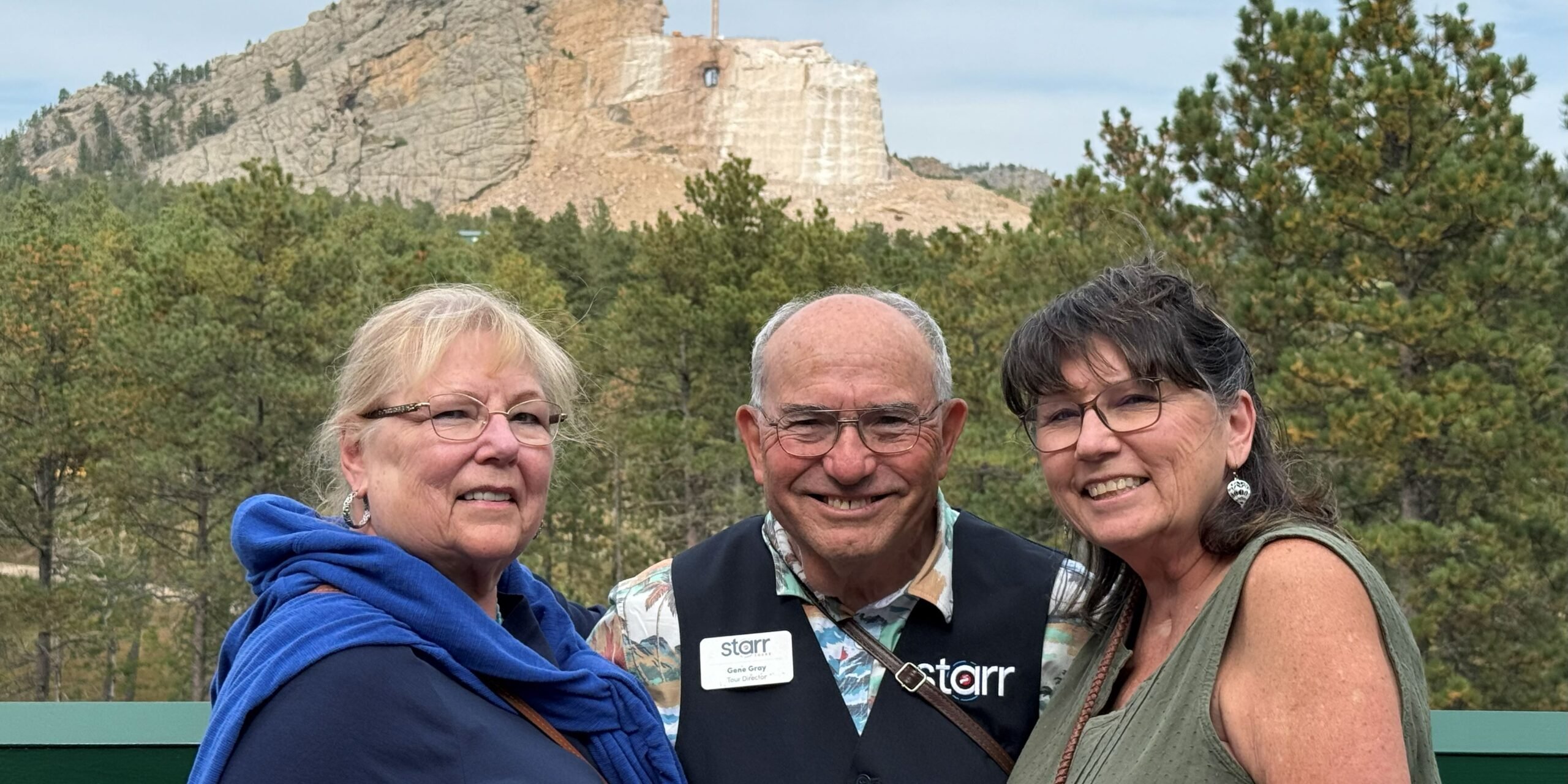 Starr Tour Director Gene Gray with Tour Guests at Crazy Horse Memorial