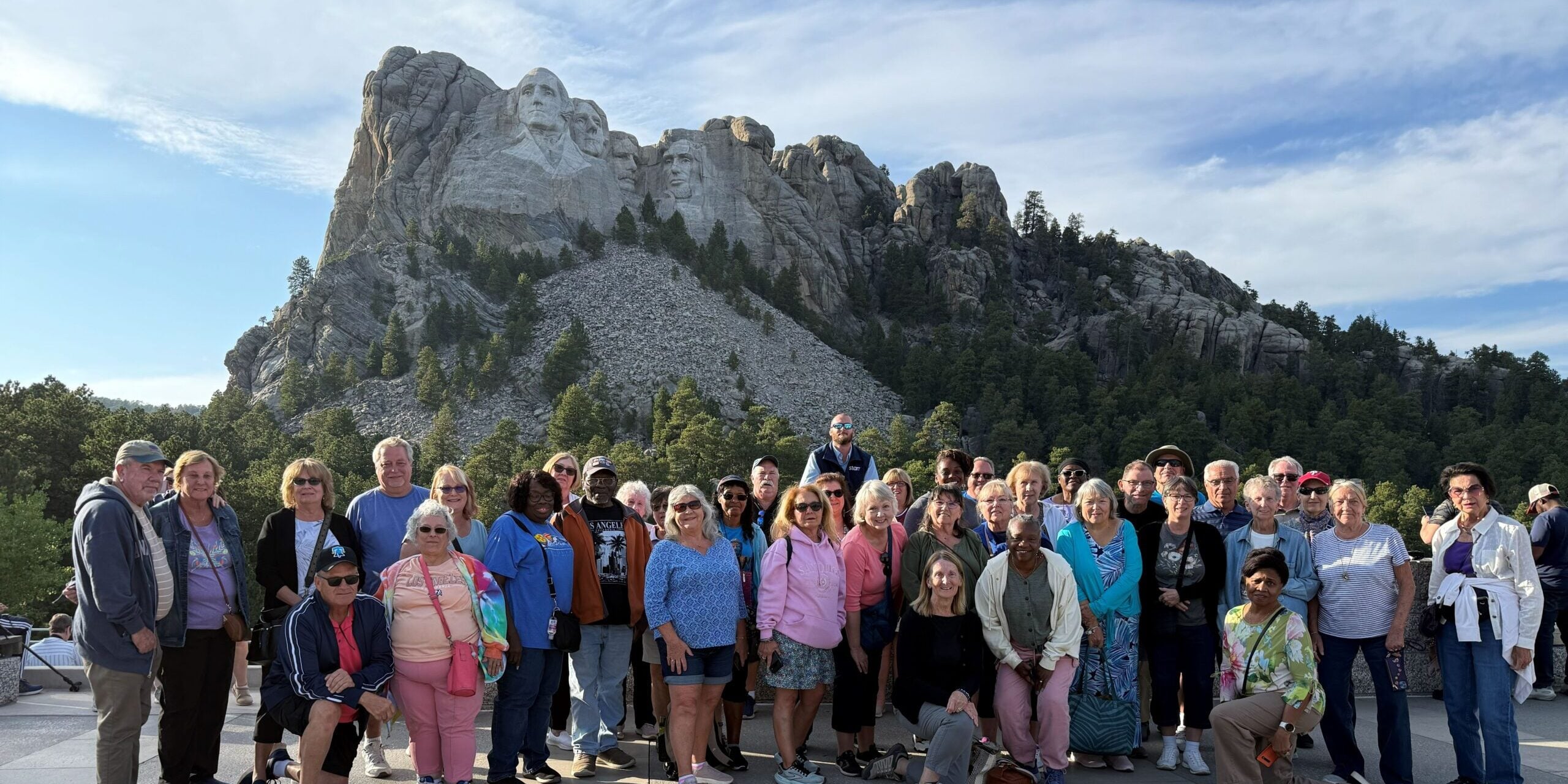 Starr Travelers in front of Mount Rushmore