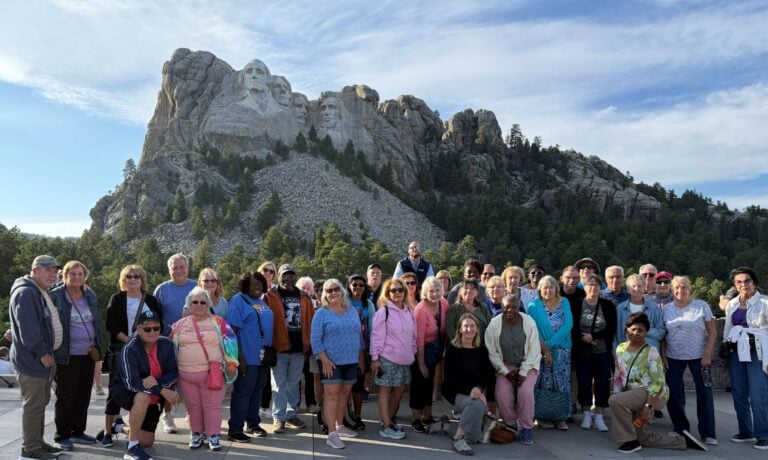 Starr Travelers in front of Mount Rushmore