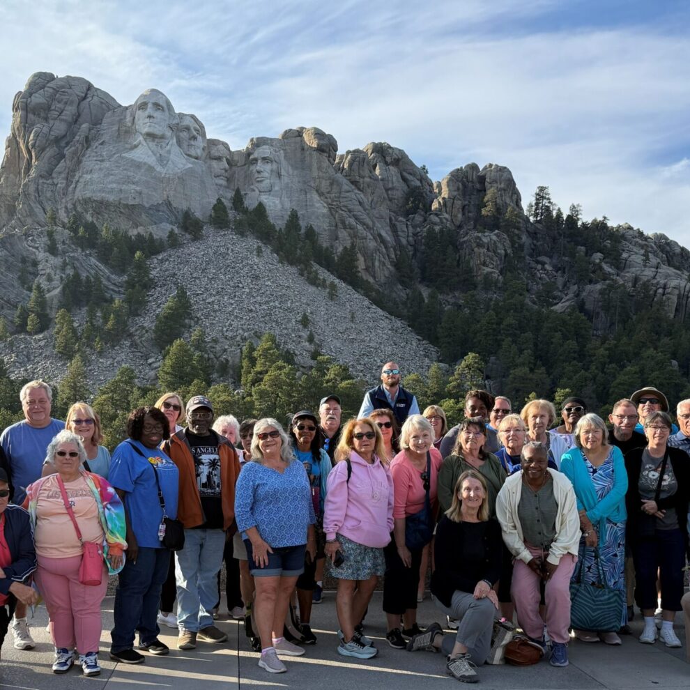 Starr Travelers in front of Mount Rushmore